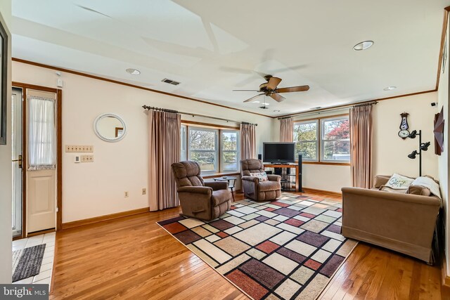 1722 Anne Ave, Baltimore, MD 21221 - living room with light wood-style floors, visible vents, baseboards, and a ceiling fan