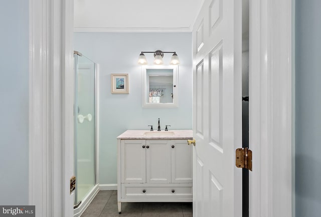 full bath featuring vanity, tile patterned floors, and a shower stall