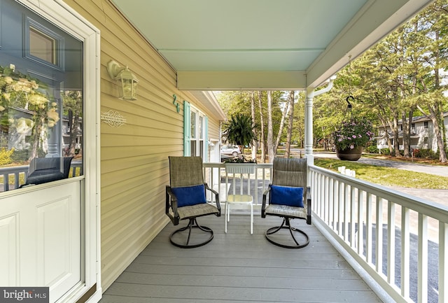 wooden deck with a porch