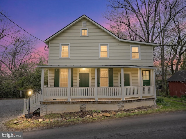 view of front of property featuring covered porch