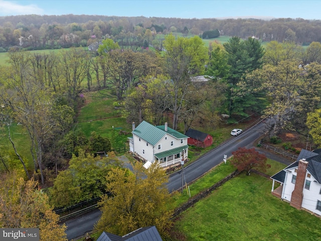 drone / aerial view with a view of trees
