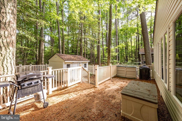 wooden deck with an outdoor structure