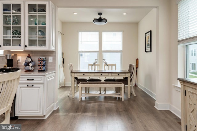 418 S Seaway Ct, Cambridge, MD 21613 - dining space featuring dark wood-style flooring and baseboards