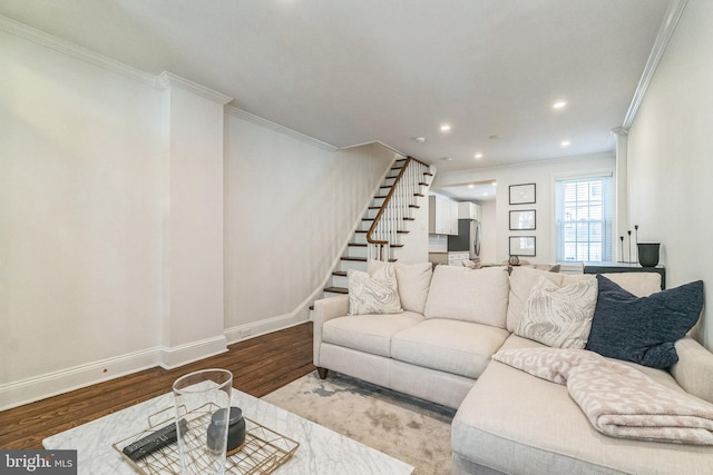 living area featuring baseboards, recessed lighting, crown molding, stairs, and wood finished floors
