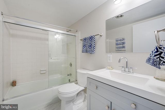 2311 Pimmit Dr Unit 1102, Falls Church, VA 22043 - bathroom featuring vanity, toilet, and combined bath / shower with glass door