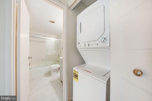 2311 Pimmit Dr Unit 1102, Falls Church, VA 22043 - washroom featuring stacked washer / drying machine