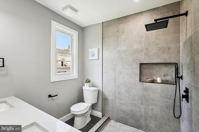 1014 Kearny St NE, Washington, DC 20017 - full bath with baseboards, a walk in shower, and toilet