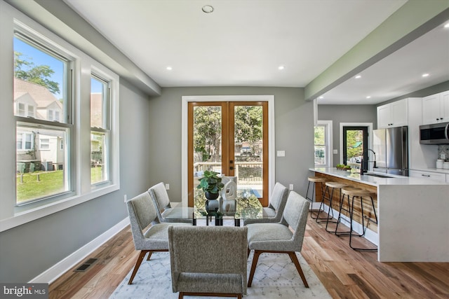1014 Kearny St NE, Washington, DC 20017 - dining room featuring visible vents, recessed lighting, light wood-style flooring, and a wealth of natural light