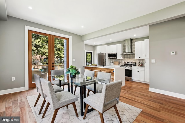 1014 Kearny St NE, Washington, DC 20017 - dining space featuring recessed lighting, baseboards, and light wood-style floors