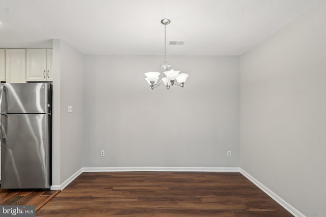 2816 Lee Oaks Pl Unit 102, Falls Church, VA 22046 - unfurnished dining area featuring a chandelier, visible vents, dark wood-style floors, and baseboards
