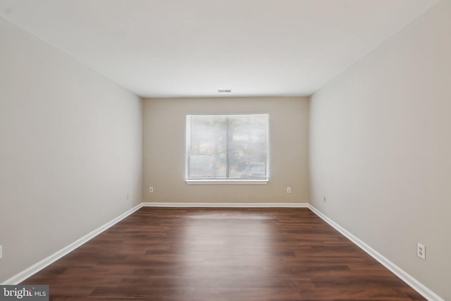 2816 Lee Oaks Pl Unit 102, Falls Church, VA 22046 - unfurnished room with visible vents, baseboards, and dark wood finished floors