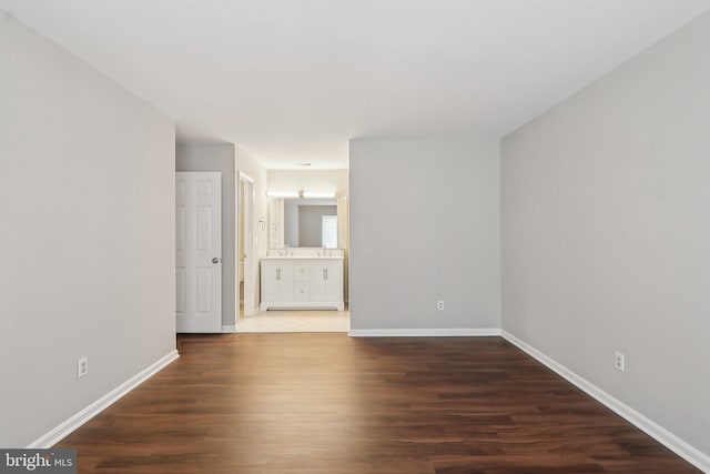 2816 Lee Oaks Pl Unit 102, Falls Church, VA 22046 - spare room with baseboards and wood finished floors