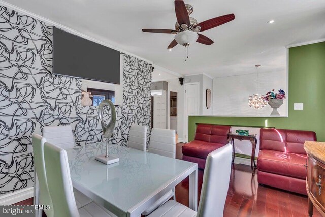 dining room with crown molding, wood finished floors, ceiling fan, and recessed lighting