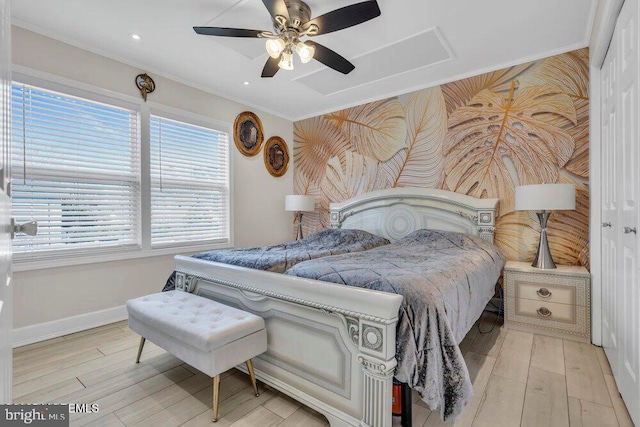 bedroom with wood finished floors, ceiling fan, baseboards, and recessed lighting