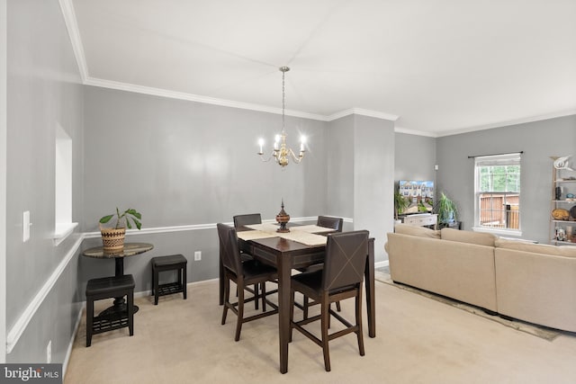 dining area featuring a notable chandelier, light carpet, ornamental molding, and baseboards