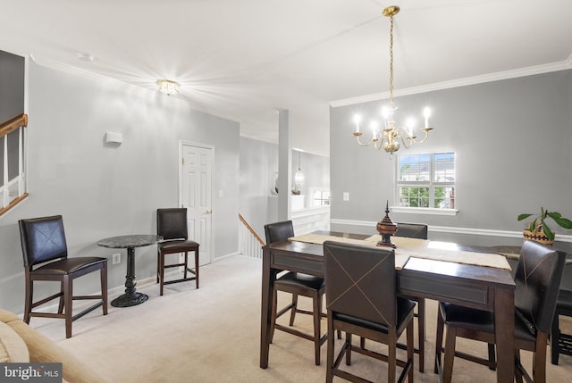 dining space with light carpet, ornamental molding, a chandelier, and baseboards