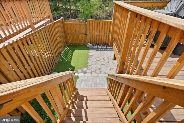view of yard featuring fence and a gate
