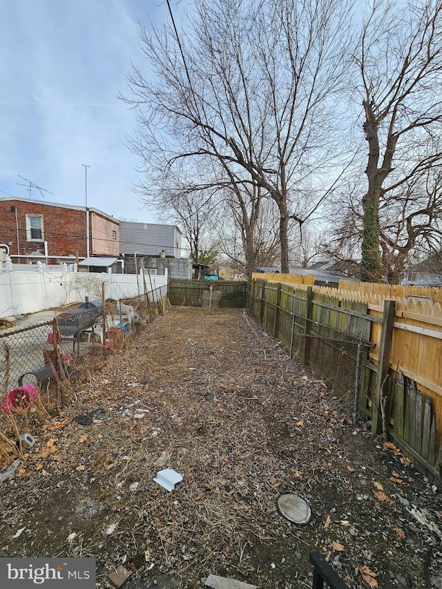view of yard featuring a fenced backyard