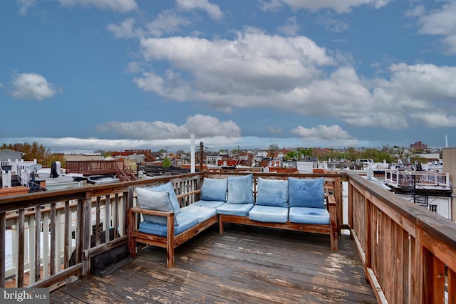 wooden deck with outdoor lounge area