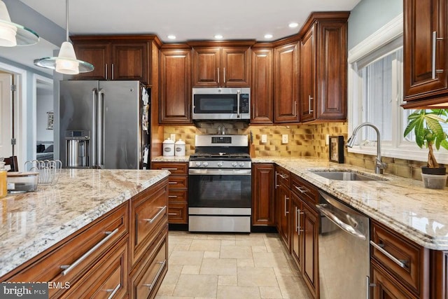 823 Forepeak Dr, Forked River, NJ 08731 - kitchen with stainless steel appliances, light stone countertops, a sink, and decorative backsplash