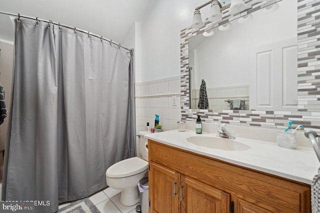 823 Forepeak Dr, Forked River, NJ 08731 - full bathroom with vanity, toilet, curtained shower, tile walls, and tile patterned floors