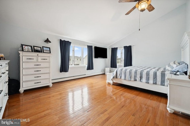 823 Forepeak Dr, Forked River, NJ 08731 - bedroom with ceiling fan, light wood-type flooring, lofted ceiling, and baseboard heating