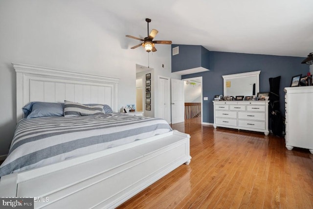 823 Forepeak Dr, Forked River, NJ 08731 - bedroom with wood finished floors, a ceiling fan, and lofted ceiling