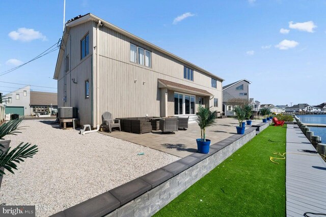 823 Forepeak Dr, Forked River, NJ 08731 - rear view of house with a patio area, cooling unit, and an outdoor hangout area