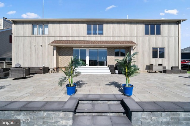 823 Forepeak Dr, Forked River, NJ 08731 - back of property with a patio