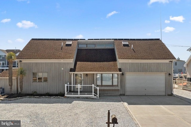 823 Forepeak Dr, Forked River, NJ 08731 - view of front of house featuring a shingled roof, a garage, and concrete driveway