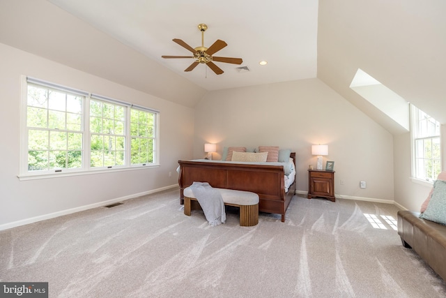 bedroom with lofted ceiling, carpet floors, baseboards, and a ceiling fan