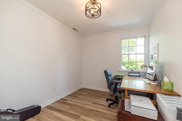 office with ornamental molding, wood finished floors, baseboards, and a chandelier