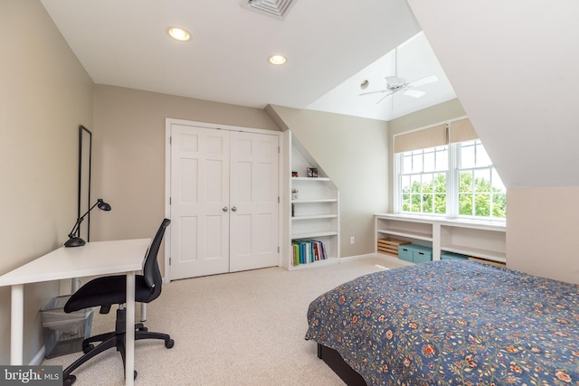 carpeted bedroom featuring vaulted ceiling, recessed lighting, an office area, baseboards, and a closet