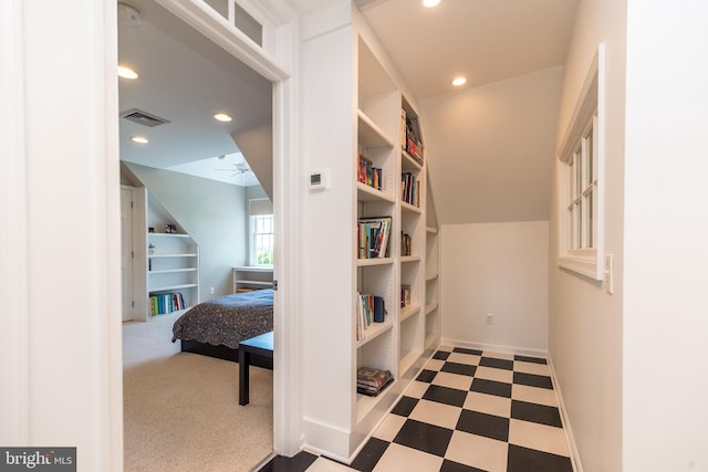 interior space featuring recessed lighting, tile patterned floors, and baseboards