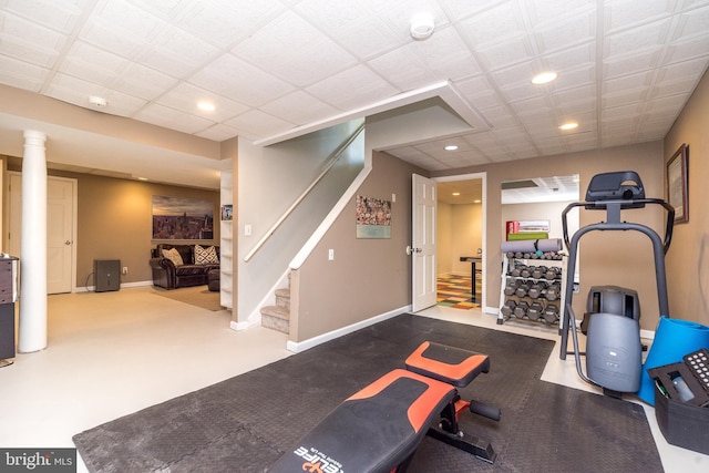 exercise room featuring recessed lighting and baseboards