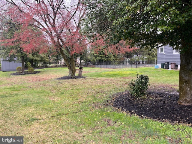 view of yard featuring fence
