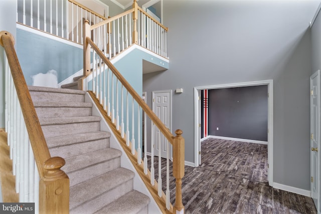 33 General Early Dr, Harpers Ferry, WV 25425 - staircase with wood finished floors and a towering ceiling