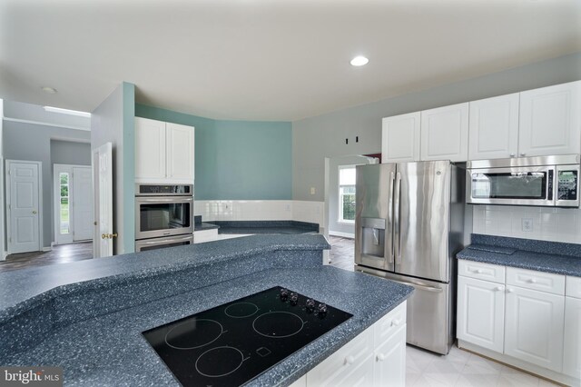 33 General Early Dr, Harpers Ferry, WV 25425 - kitchen with appliances with stainless steel finishes, white cabinets, dark countertops, backsplash, and recessed lighting