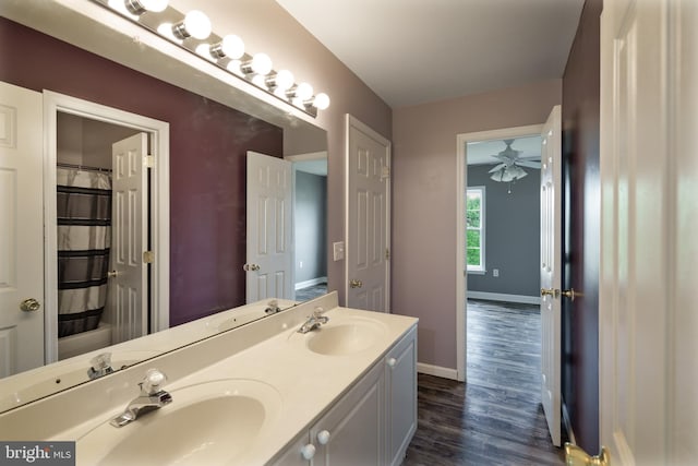 33 General Early Dr, Harpers Ferry, WV 25425 - bathroom with double vanity, wood finished floors, and ceiling fan