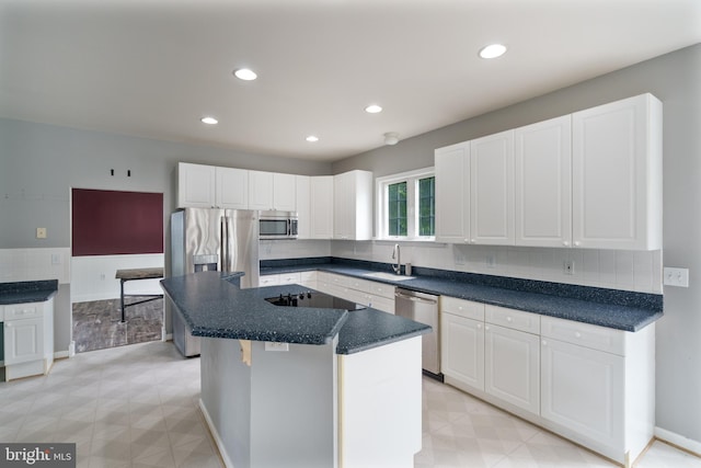 33 General Early Dr, Harpers Ferry, WV 25425 - kitchen with appliances with stainless steel finishes, white cabinetry, dark countertops, and recessed lighting