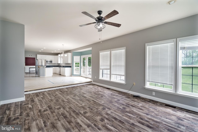 33 General Early Dr, Harpers Ferry, WV 25425 - unfurnished living room featuring a chandelier, wood finished floors, ceiling fan, and recessed lighting