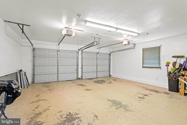 garage featuring a garage door opener