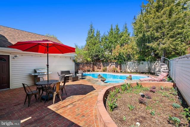 view of swimming pool featuring a fenced backyard, a patio area, an in ground hot tub, and a fenced in pool