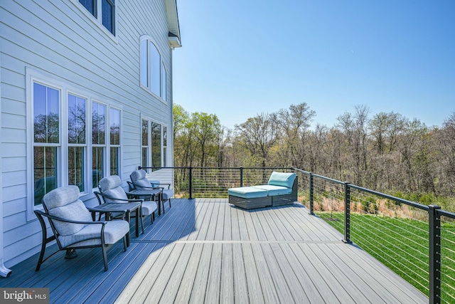 deck featuring a yard