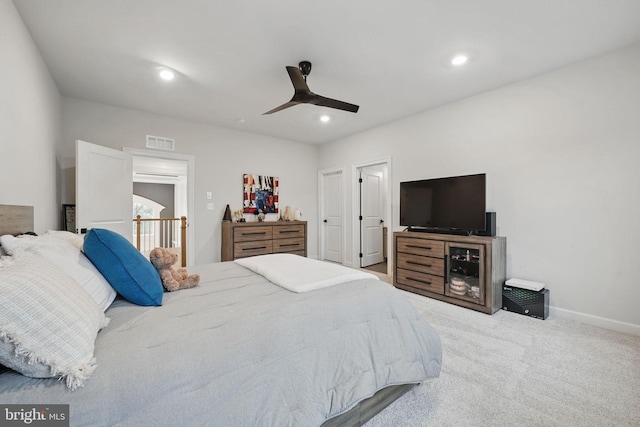 carpeted bedroom featuring visible vents, ceiling fan, recessed lighting, and baseboards