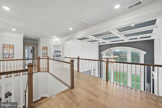 corridor featuring visible vents, a notable chandelier, an upstairs landing, and recessed lighting