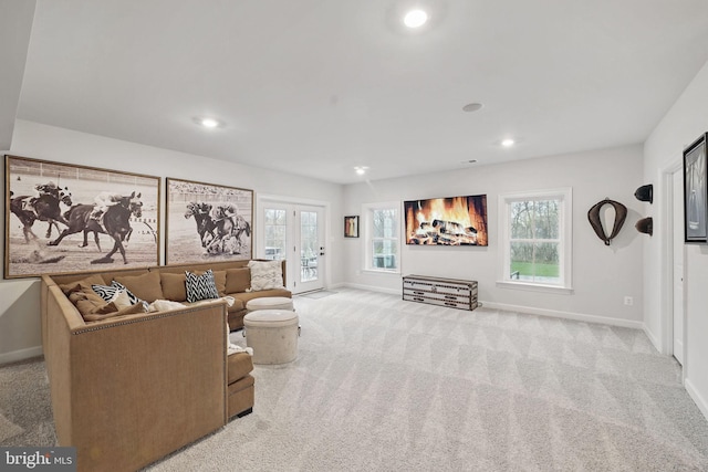 living area featuring baseboards, carpet, and recessed lighting