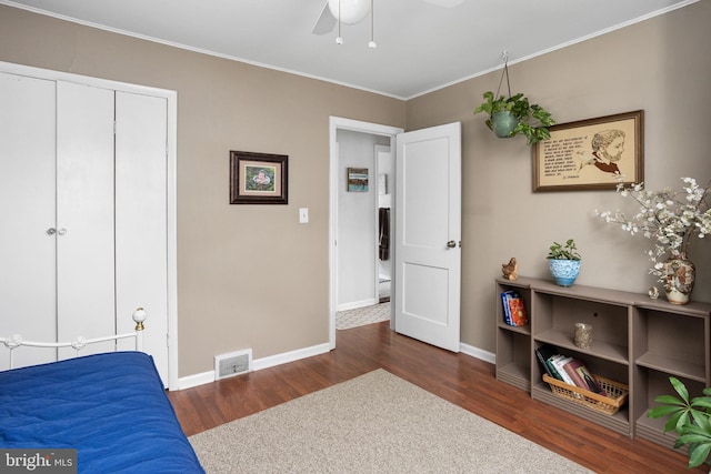 1 Pheasant Ln, Hamilton, NJ 08690 - bedroom featuring wood finished floors, baseboards, ornamental molding, ceiling fan, and a closet