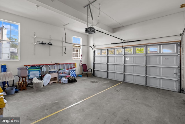 garage featuring a garage door opener