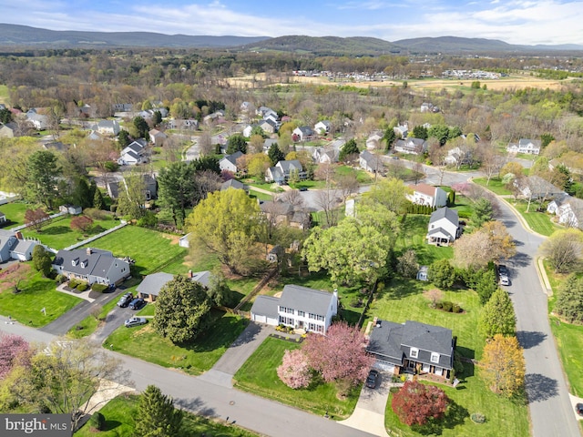 aerial view featuring a mountain view and a residential view